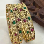 Matte-Gold-Plated-Bangles-with-Ruby-and-Green-Kempu-Stones