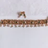 Traditional-Temple-Lekshmi-Coin-with-Green-Stones-and-Pearl-Drops-Choker